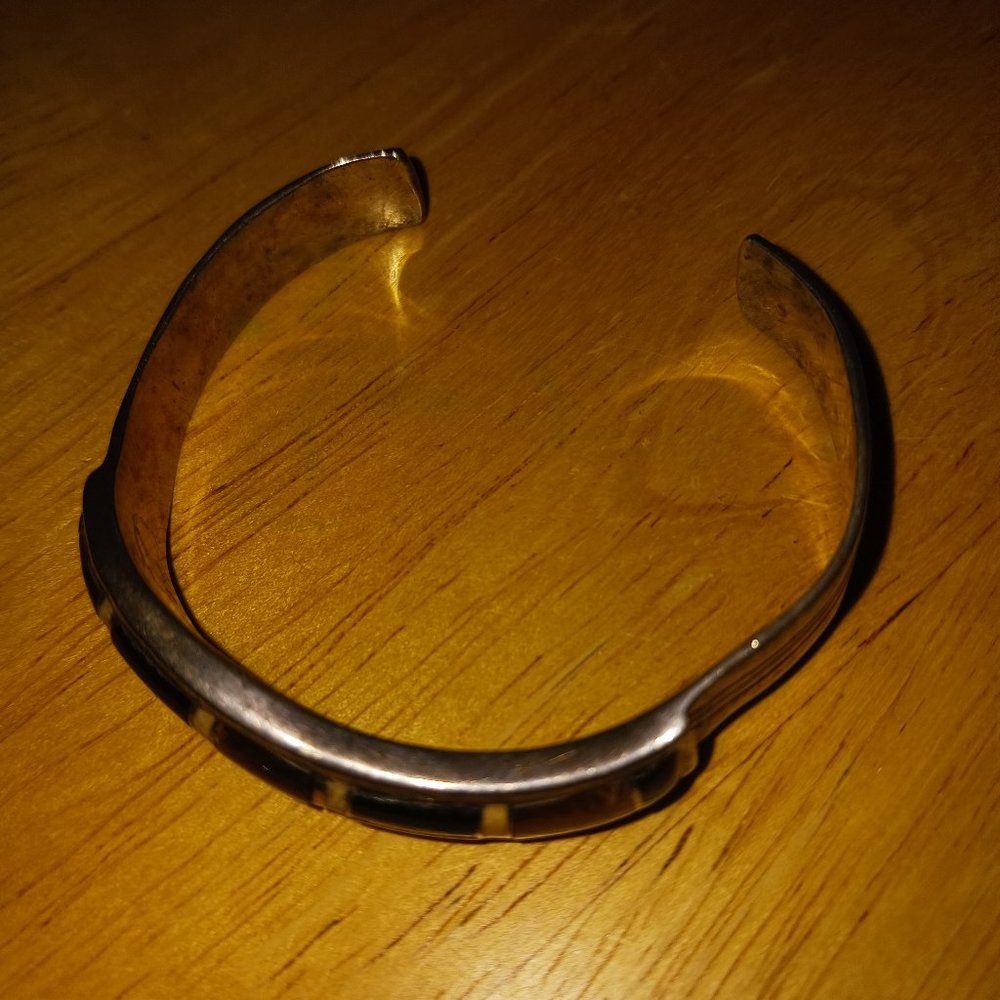 Silver bangle with stones